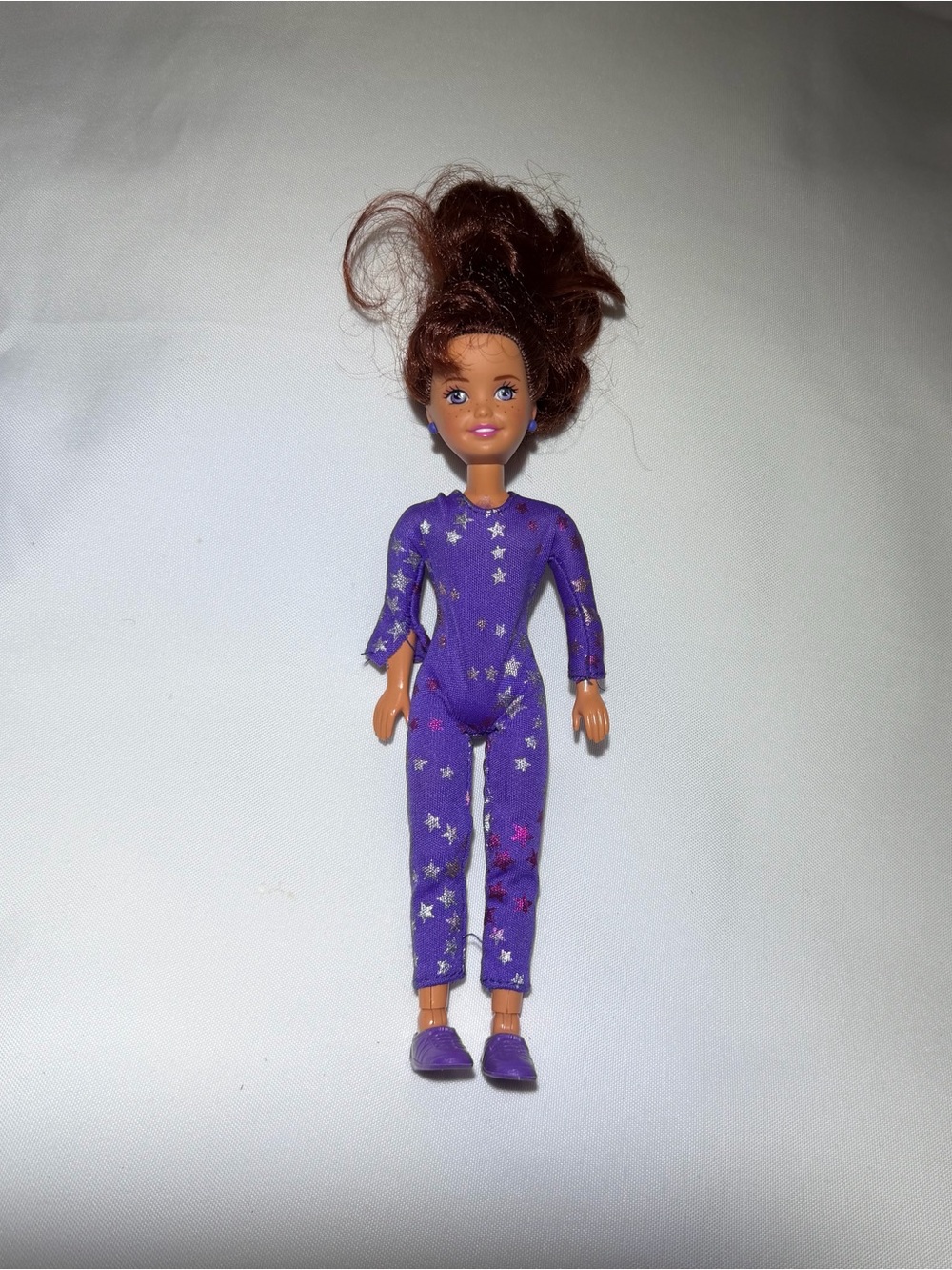 Mattel Purple Star Jumpsuit Fashion Doll with Brown Hair